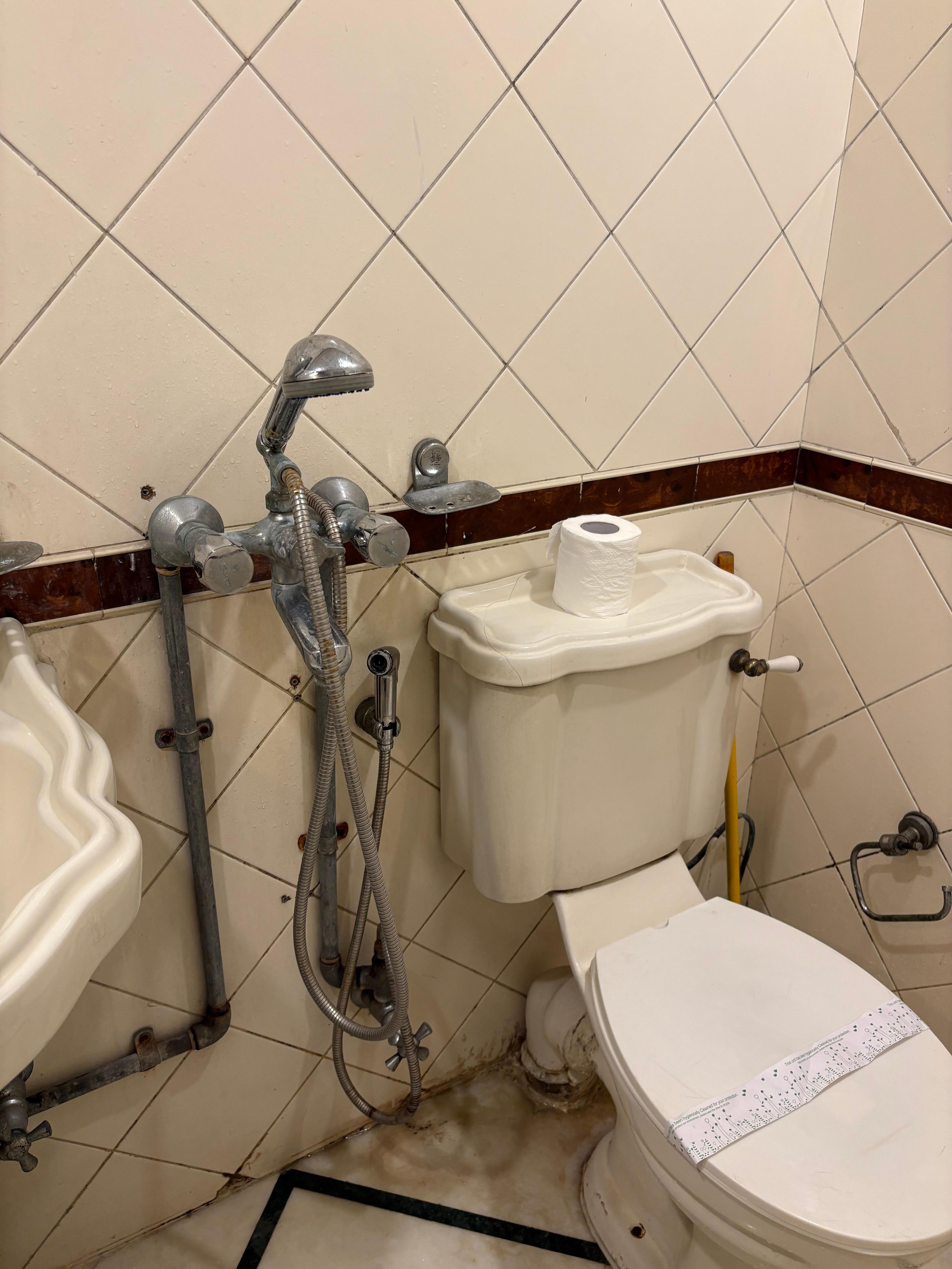 The bathroom did have a separate shower compartiment. Also, this room needed to be accessed through the balcony. 