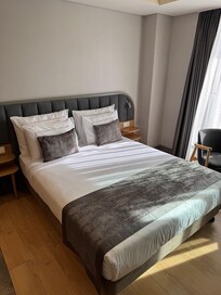 Bett im Deluxe-Zimmer