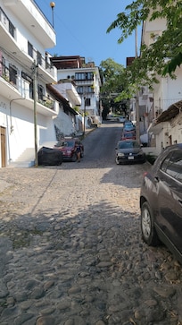 View of the hill up to apartment