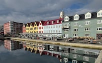 The hotel is on the left of the picture.