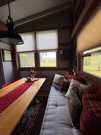 The table and comfortable reading day bed.