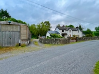 Front of cottage with ample parking