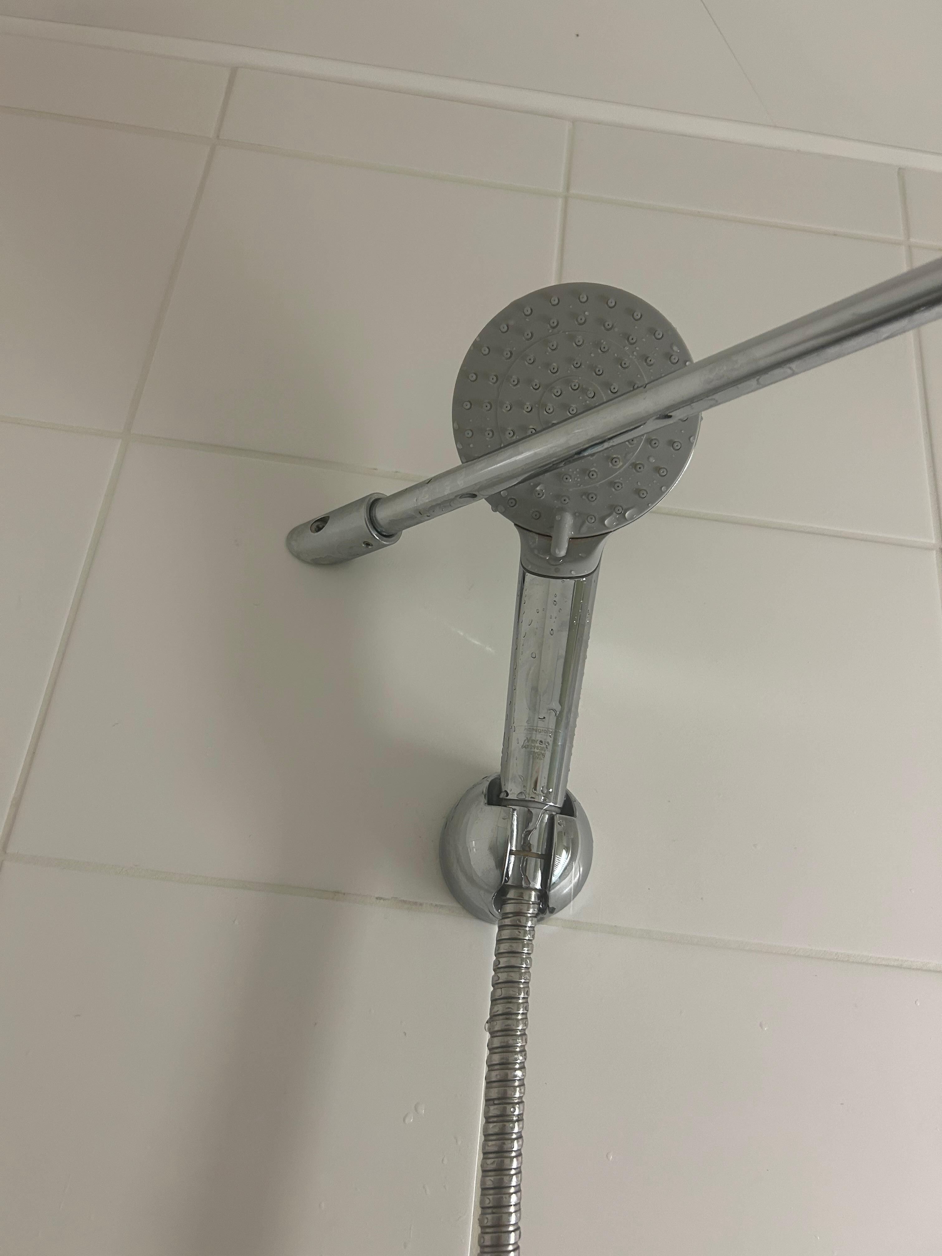 Top shower holder was not accessible as there was a pole in the way