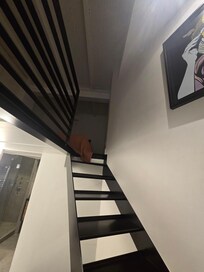 Stairs to bedroom 2.