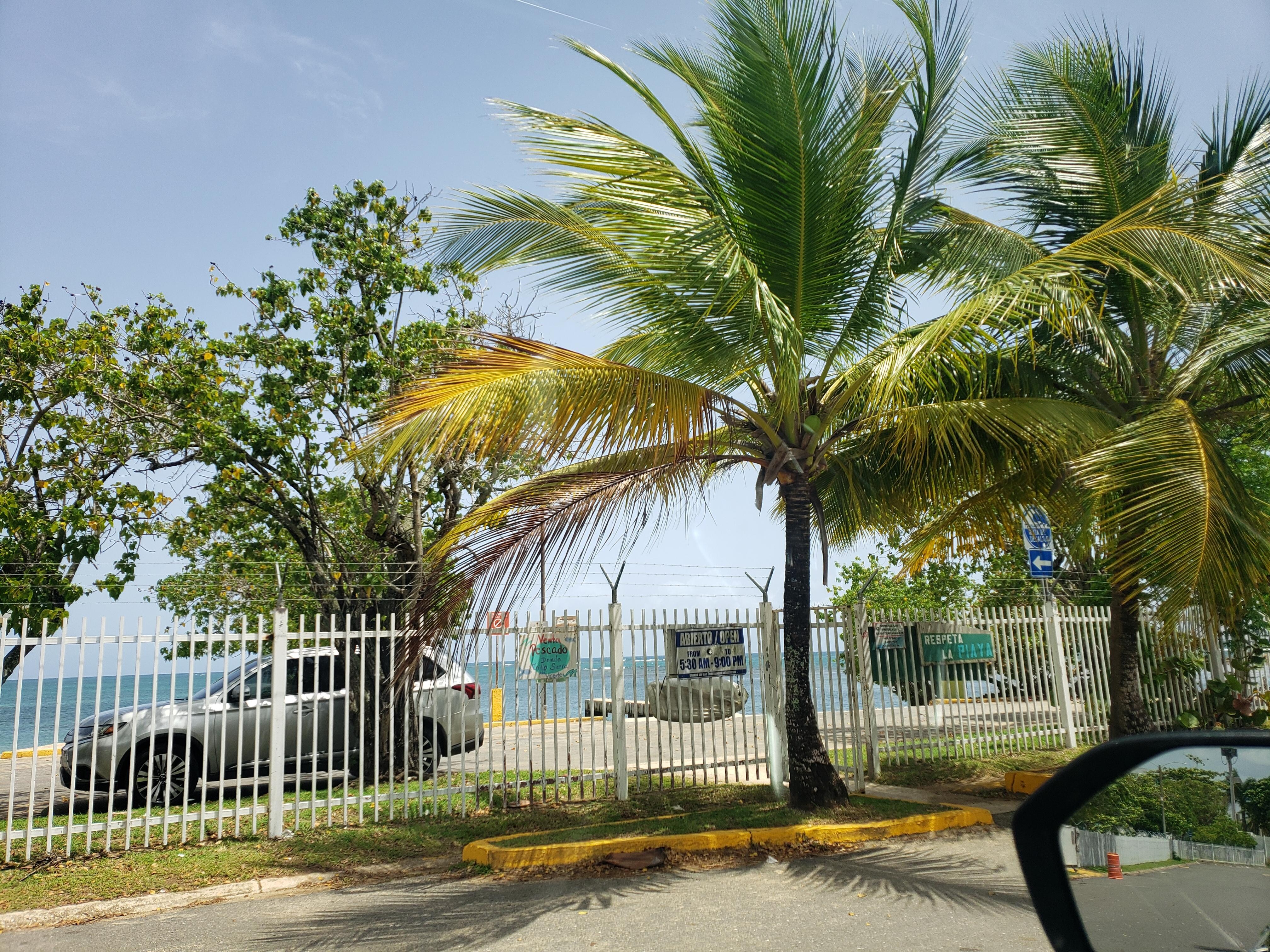 Beautiful beach across the street calm and clear waters.