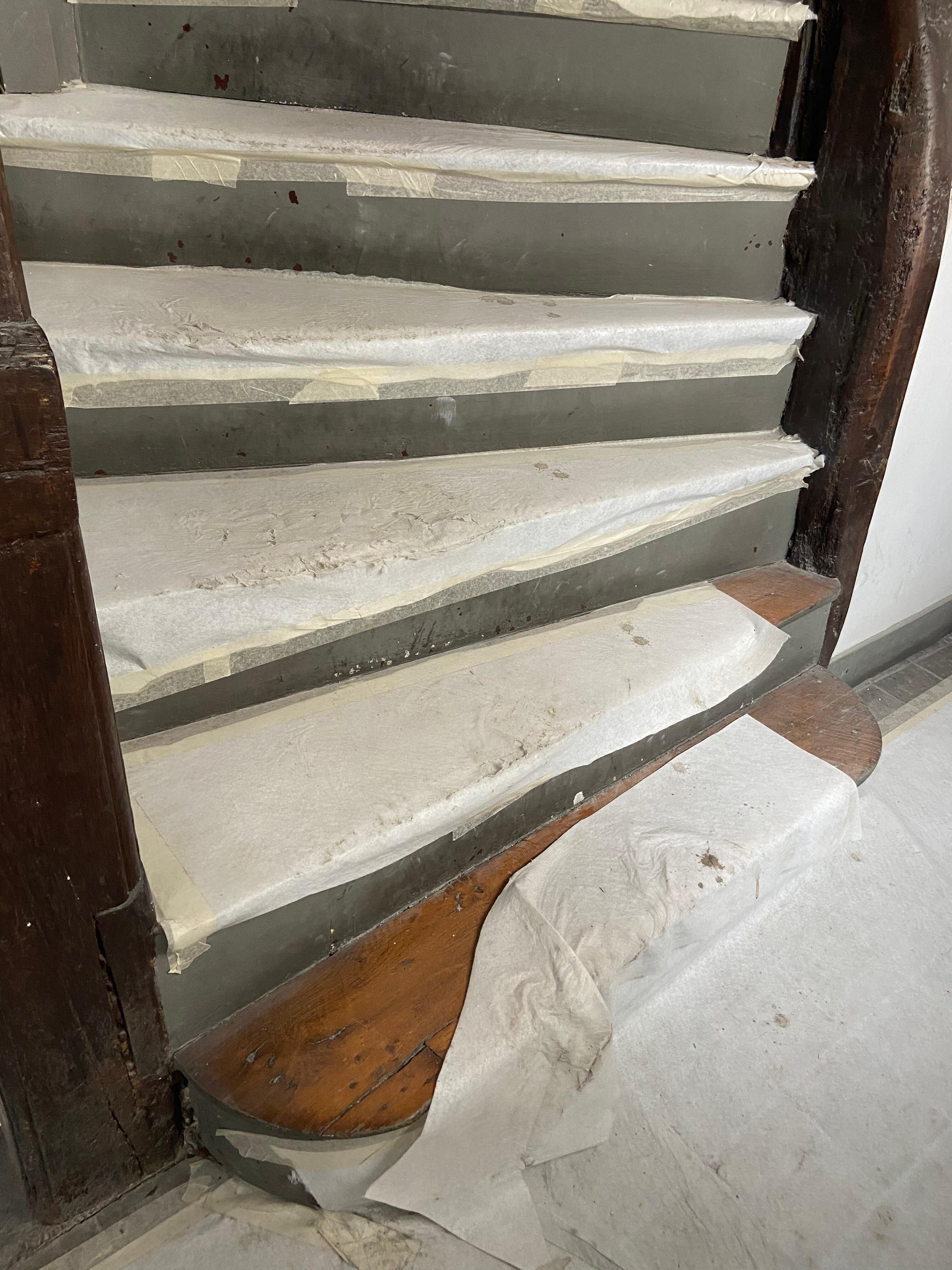 Stairs going up to the apartment. Dangerous, wiggly 2 steps 
