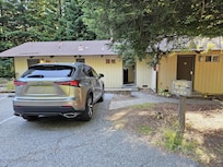 Group of 4 cabins and designated parking spots right in front