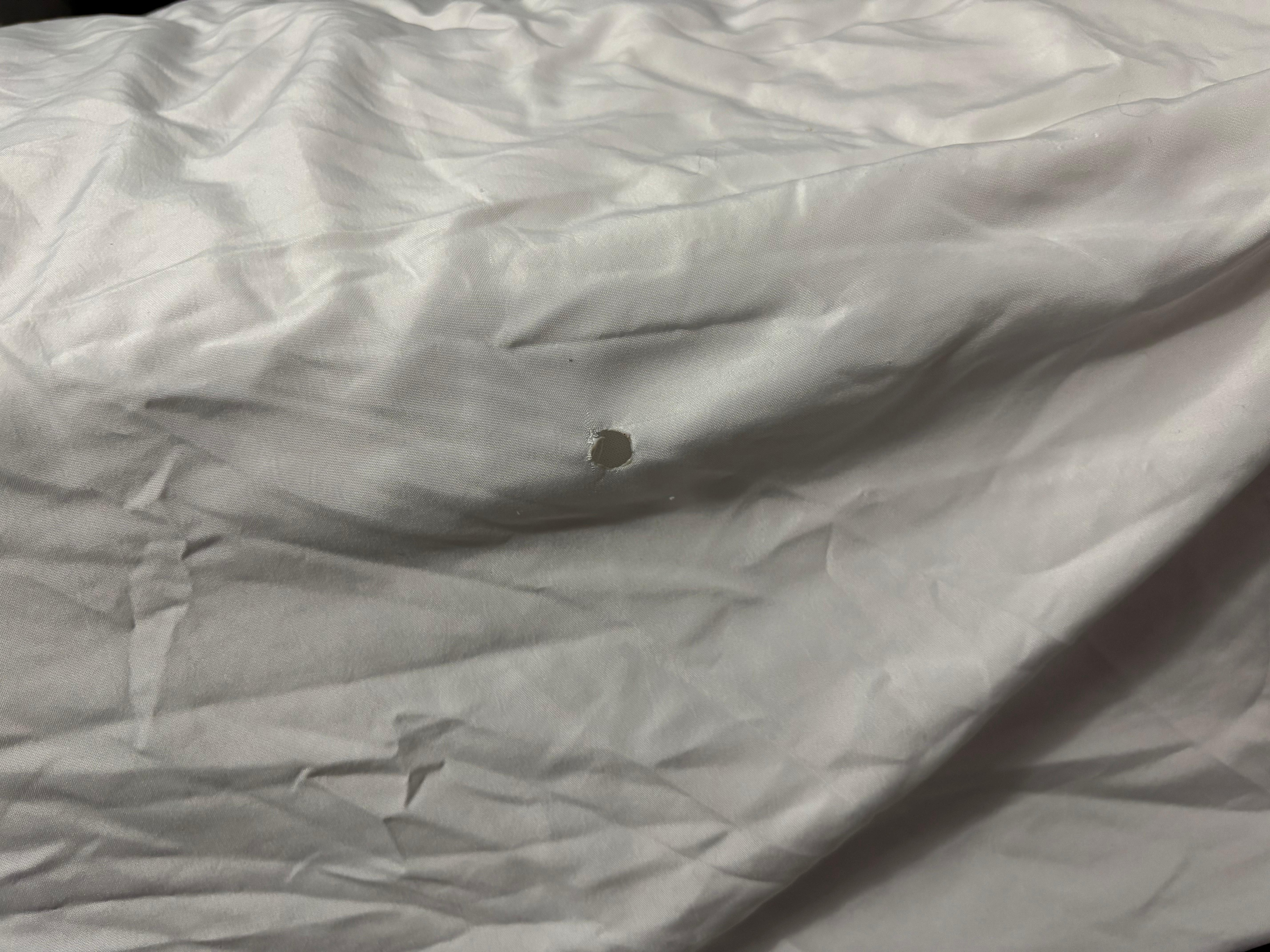 Hole in the bed sheet