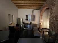 The apartment was unreasonably dark, even with all lights on, and the windows faced a wall, resulting in no natural light. The unit felt closed-in and did not resemble the listing photos, which were misleading and did not accurately represent the spa