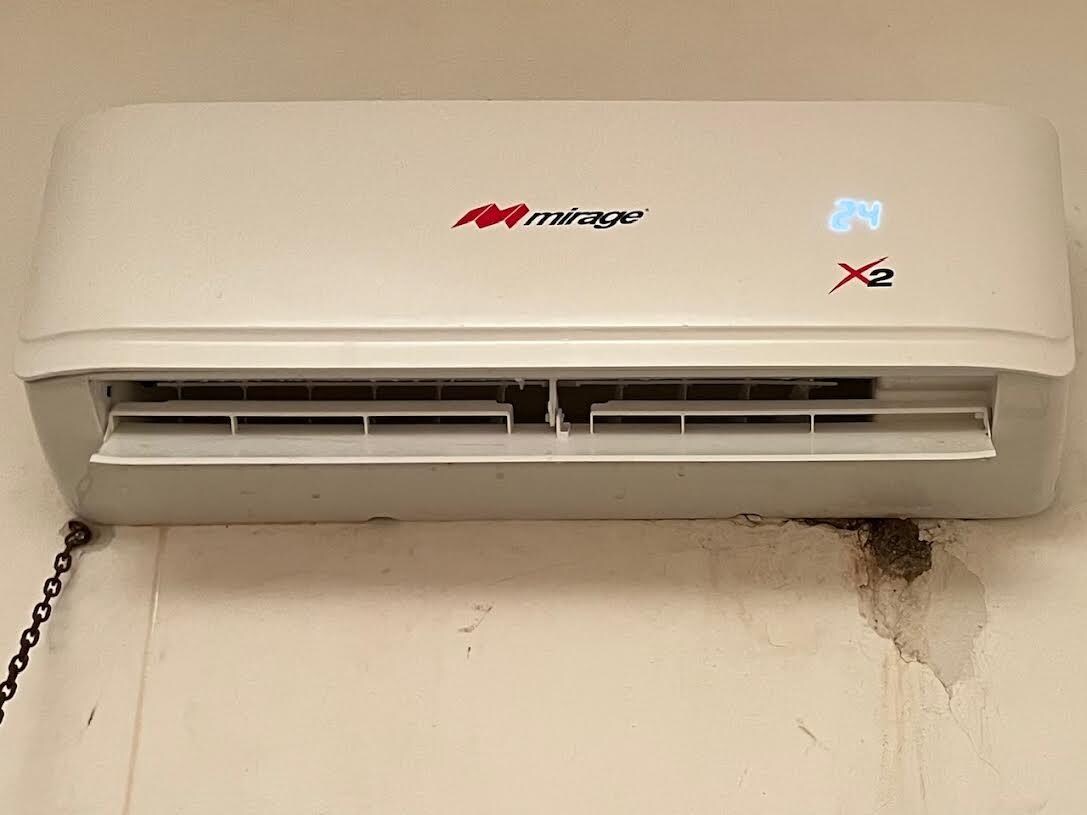 AC init water running down wall