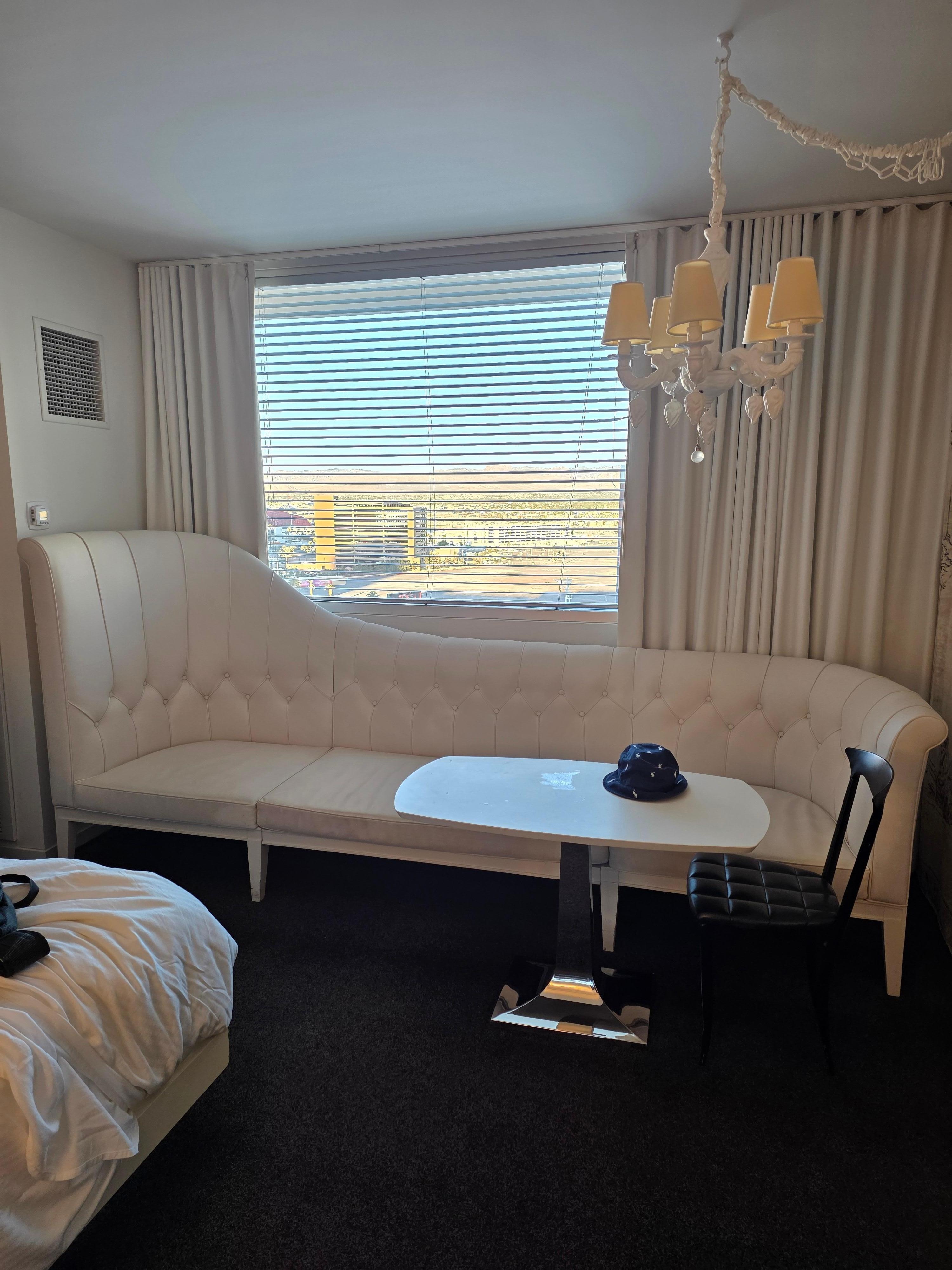 A 10 foot chaise capped of the royalty themed room