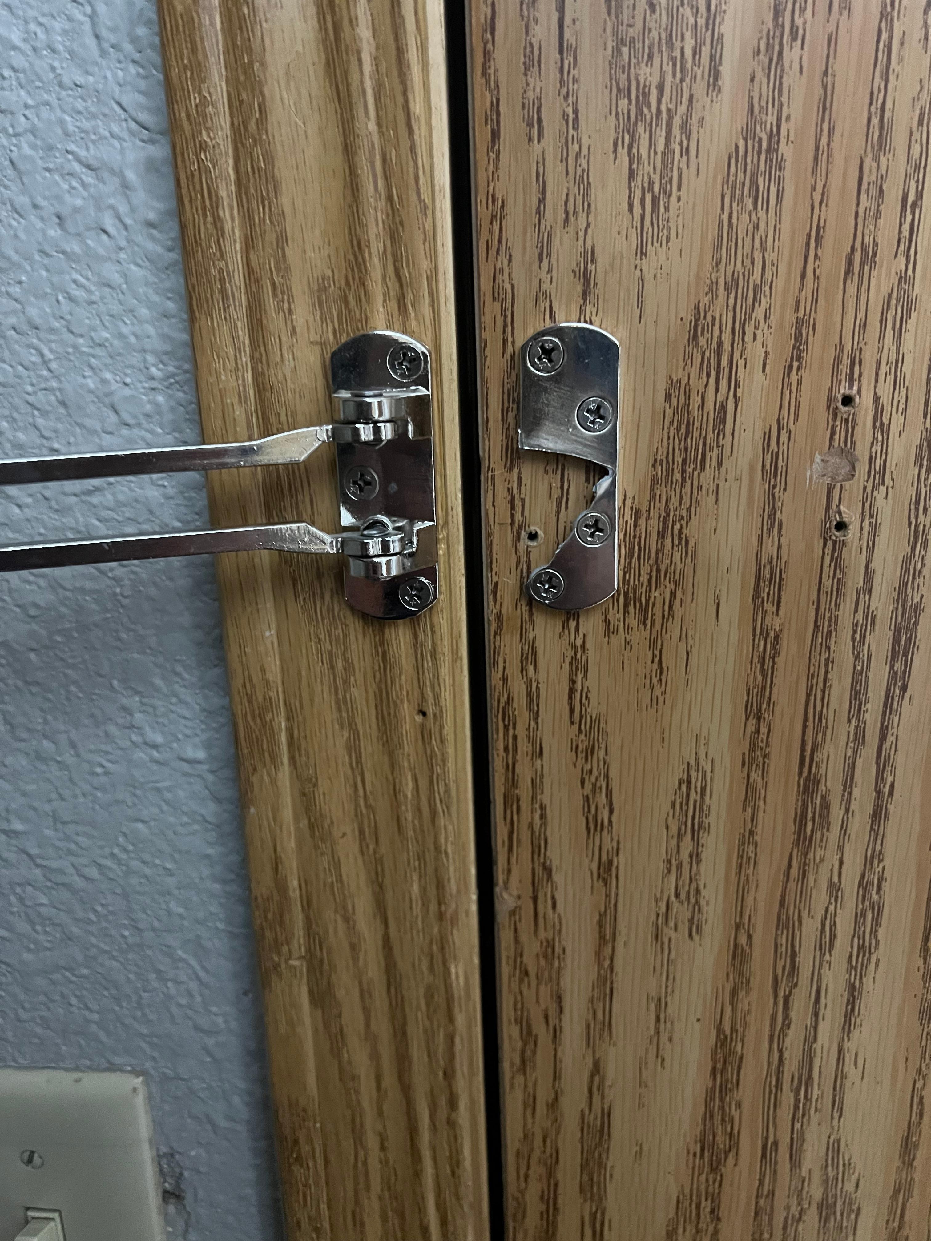 Cheap, broken bar lock. 