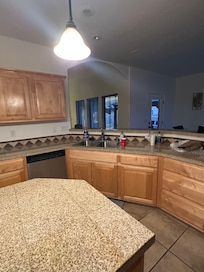 large kitchen to share cooking tasks but needs a few items i.e. corkscrew, bigger pot and baking pan