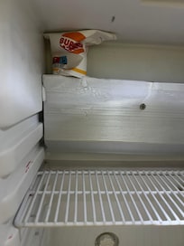 Trash left in fridge had to clean ourselves to use it