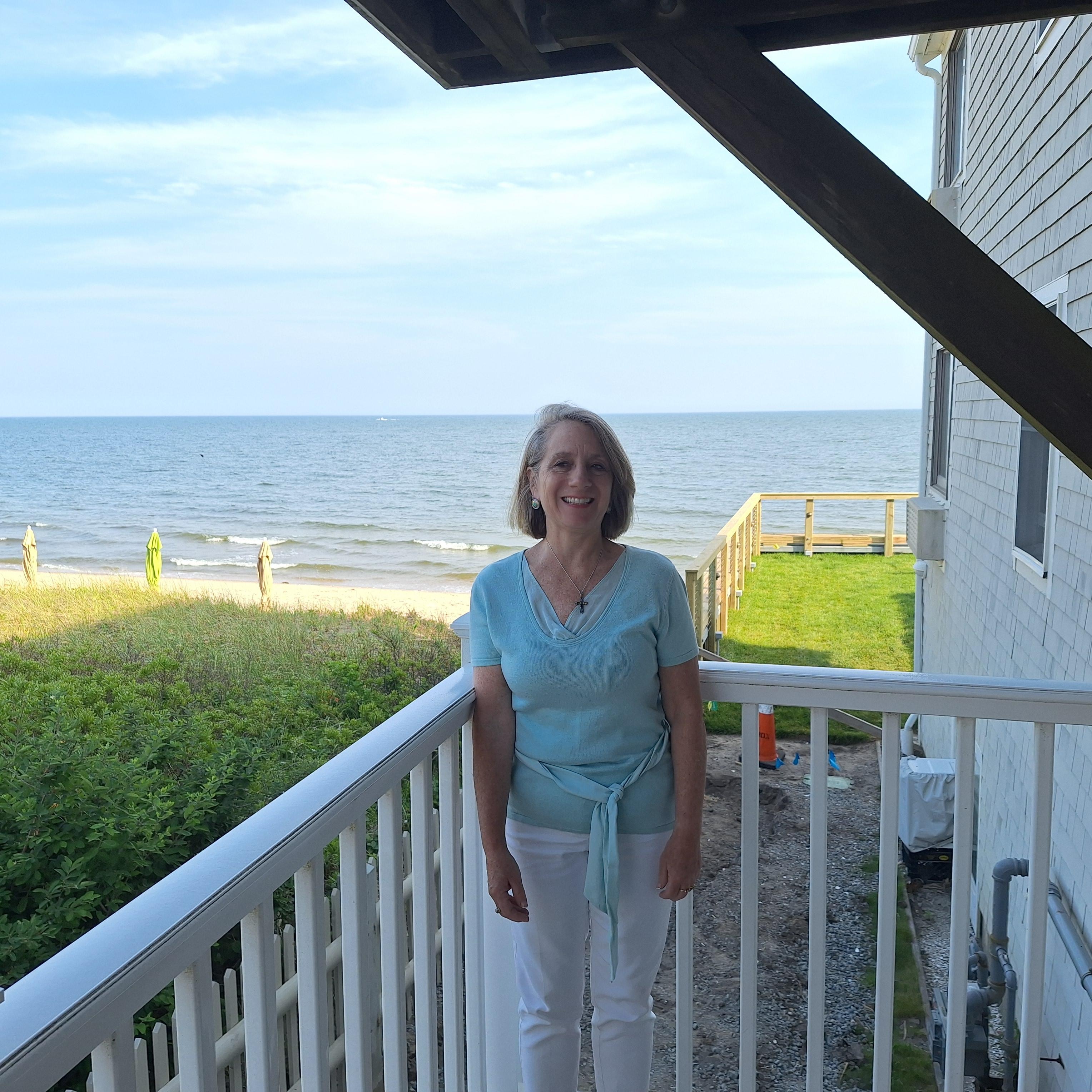 My wife enjoying time on our balcony. 