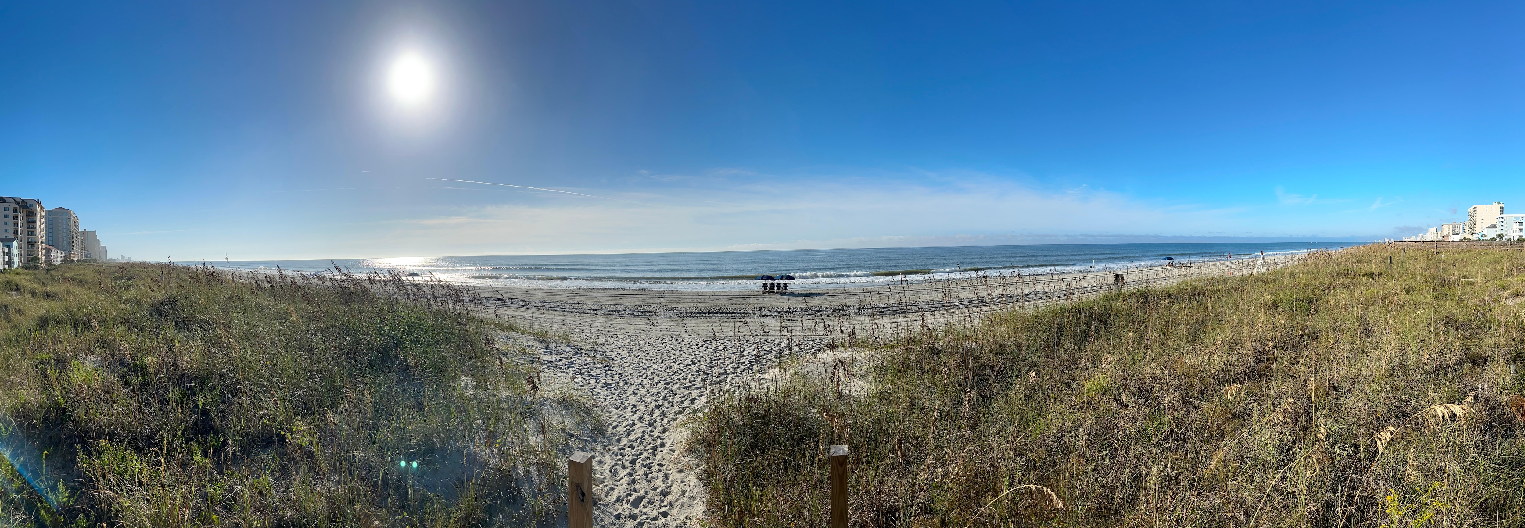 Panoramic view of beach area in front of villa 