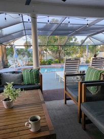 Enjoying morning coffee in a beautiful backyard space