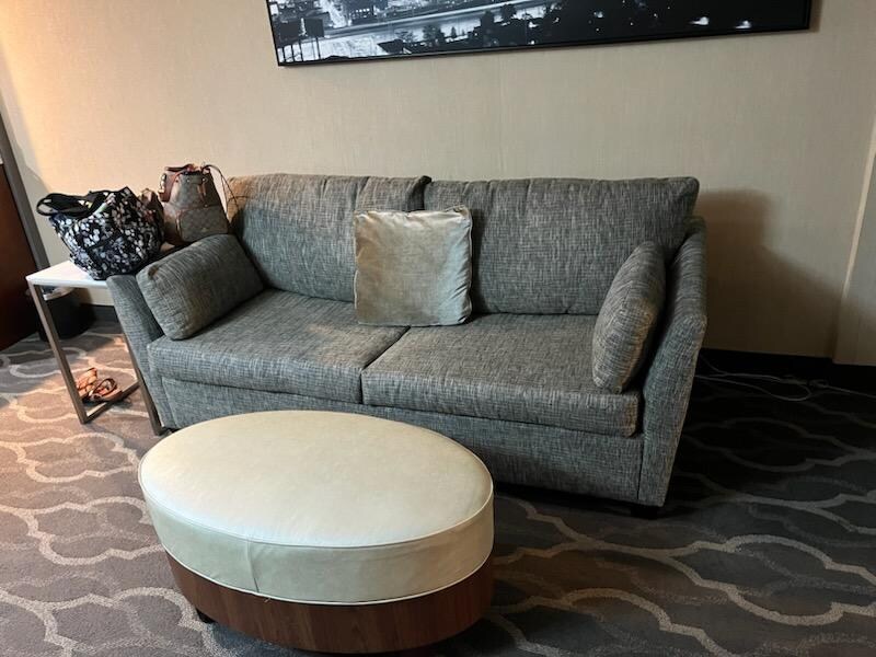 Couch is very worn.
