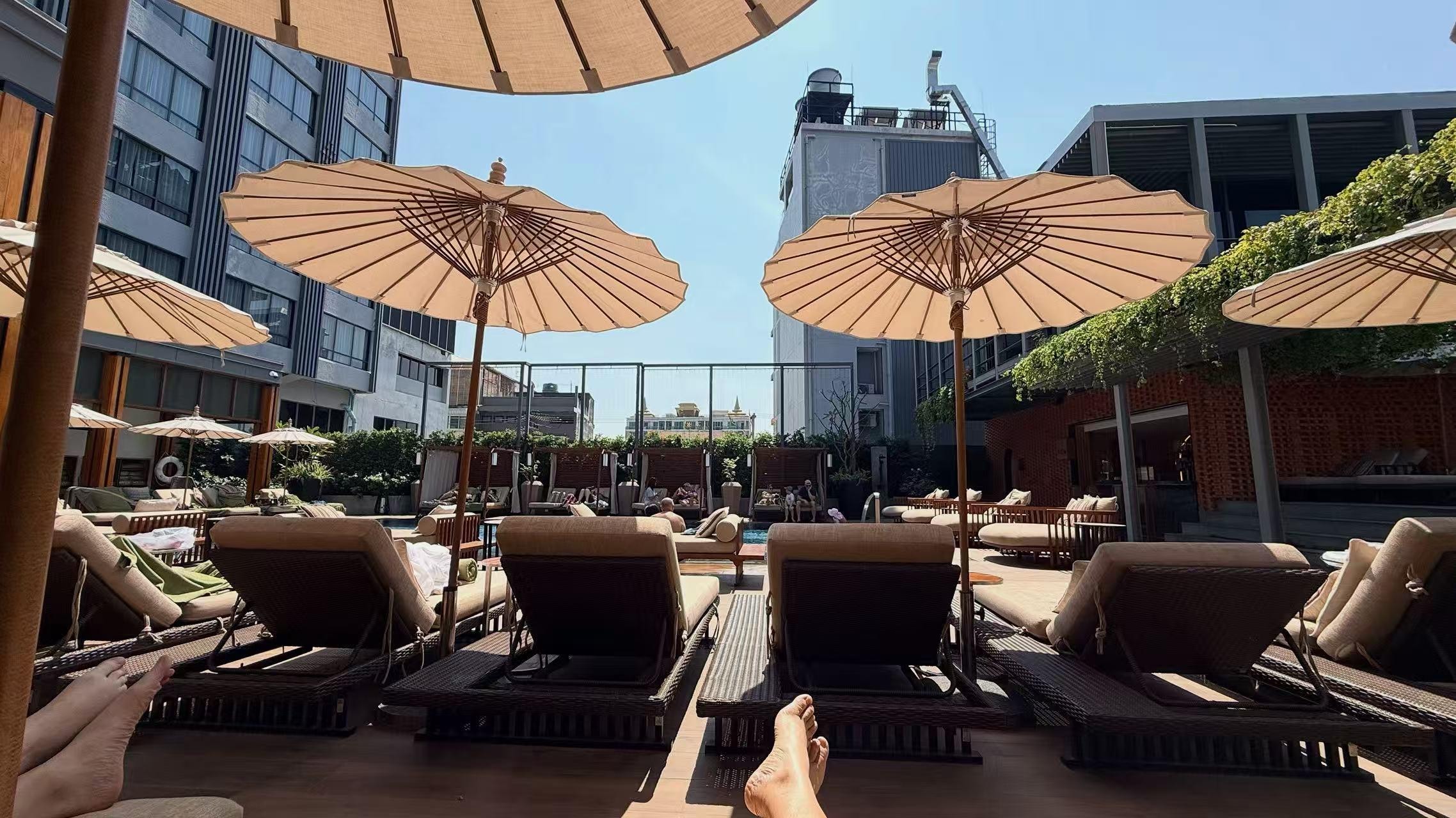 Outside near the swimming pool