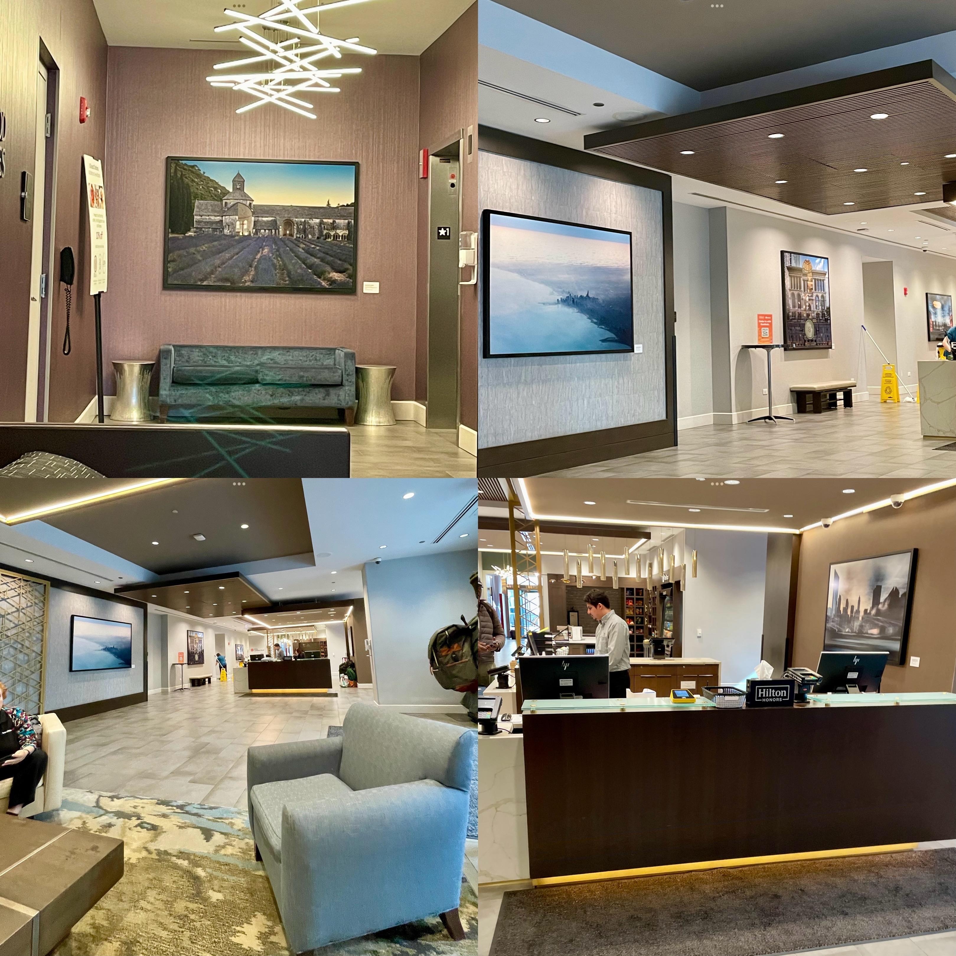 Art, seating, and a store in the spacious lobby