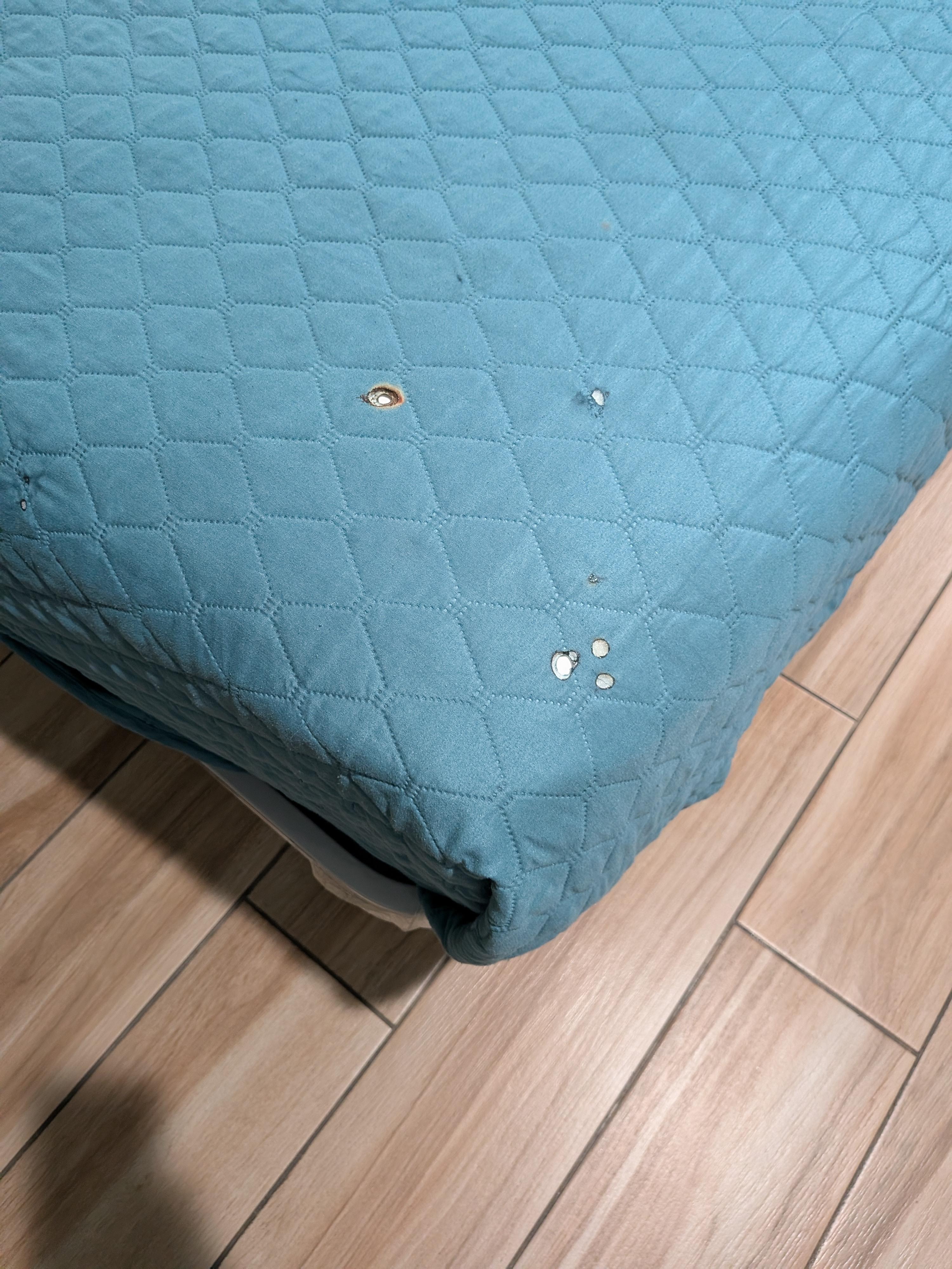 Burn marks on comforter.