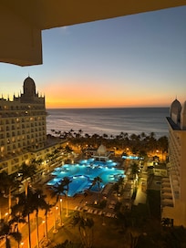 View from our ocean view room balcony at sunset!