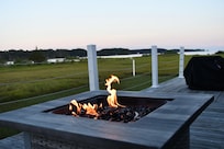 Relaxing on the deck by the fire.