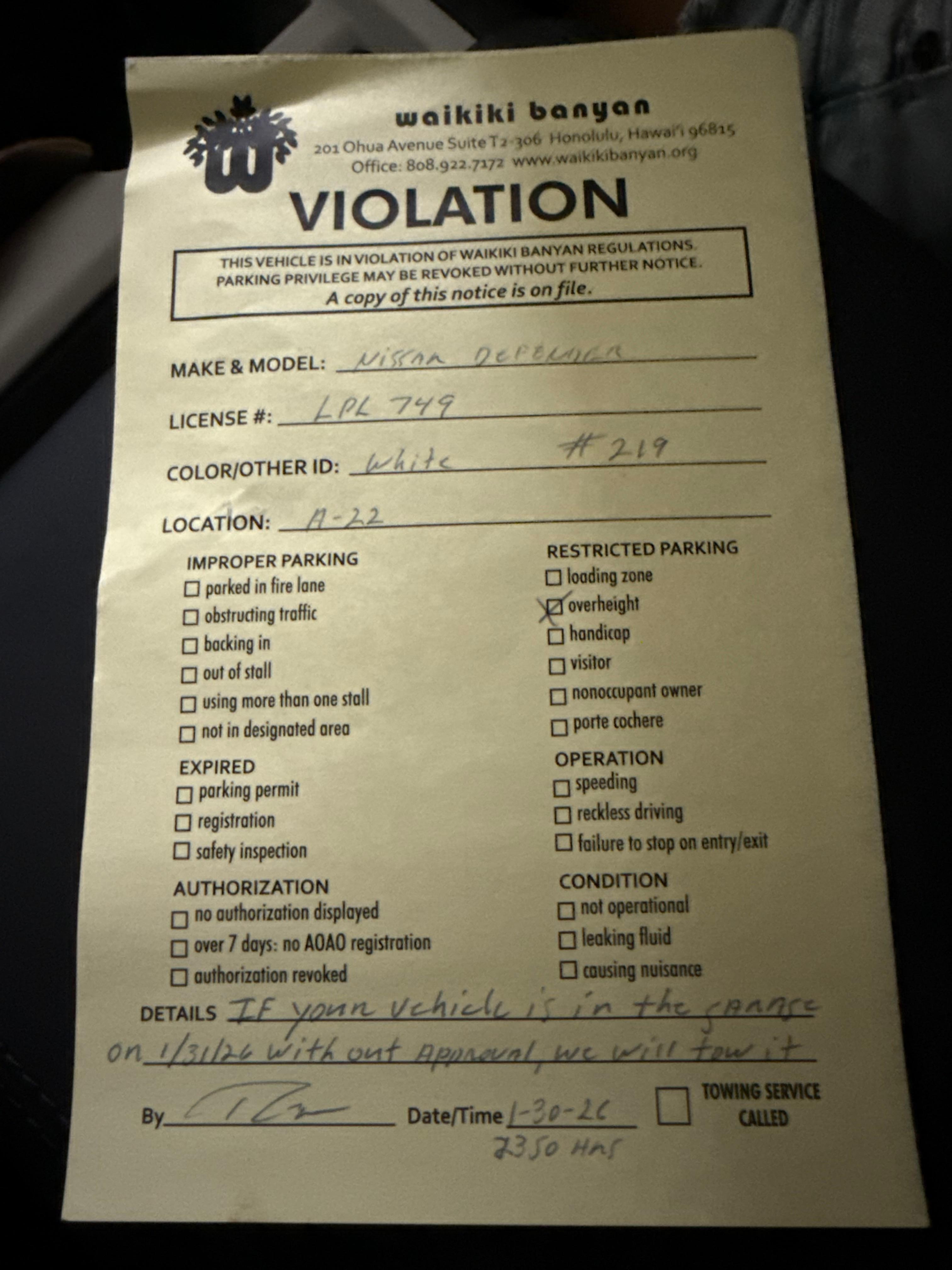 Violation for parking in the garage with a vehicle not listed in the properties description 