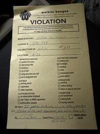 Violation for parking in the garage with a vehicle not listed in the properties description