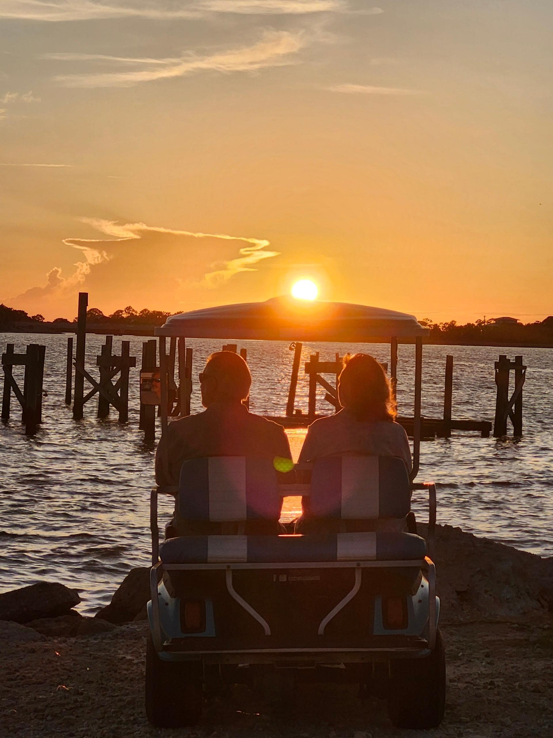 Watching sunset from golf cart