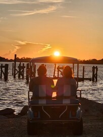 Watching sunset from golf cart