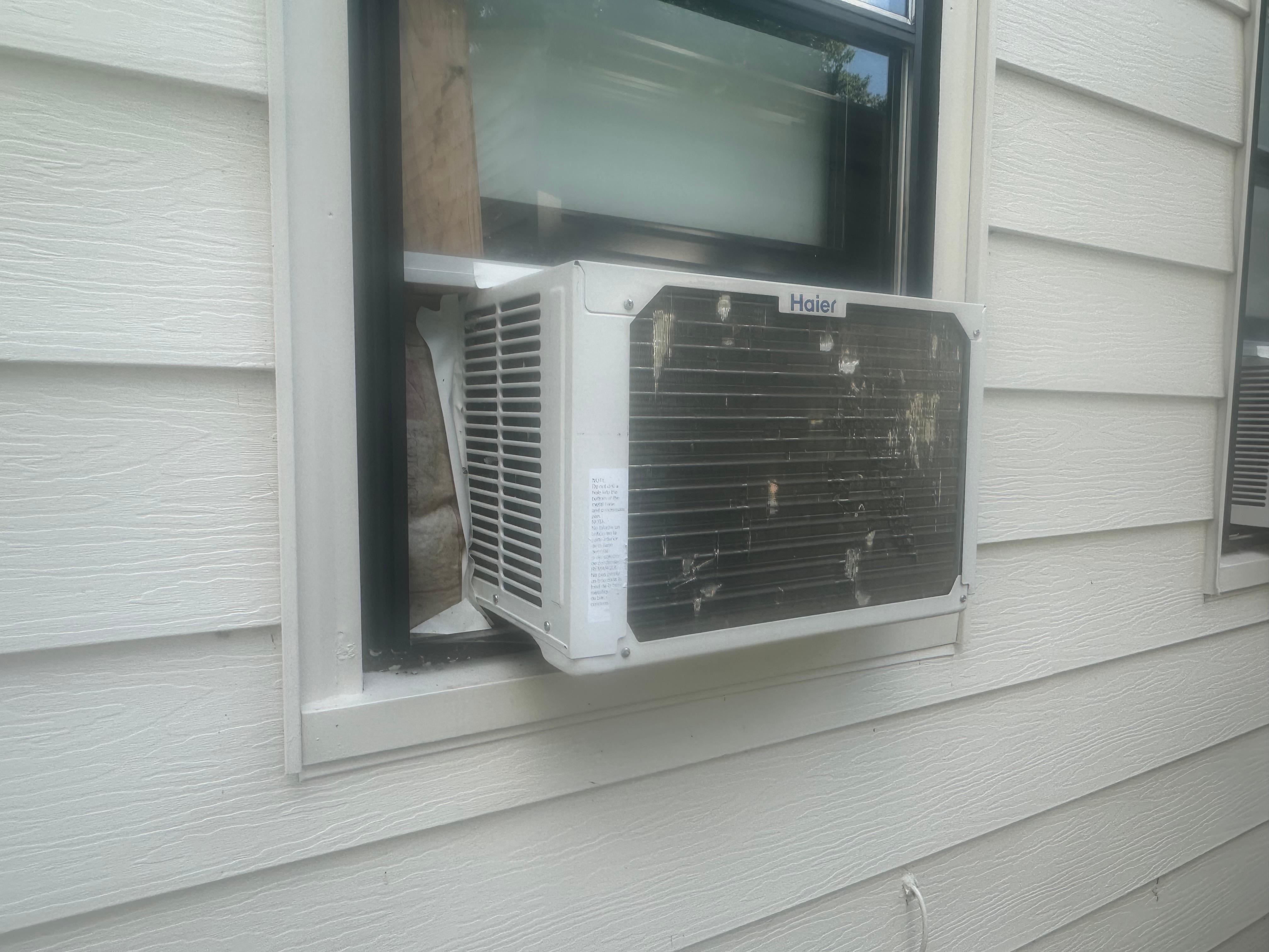 Old noisy window A/C units, NOT central air.
