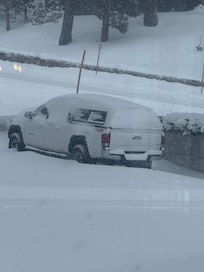 Neighbors truck after the first snow hit. Total of 3'. Awesome.