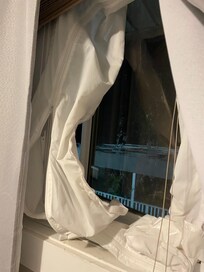 Window open to outside deck unable to close due the tape and plastic buildup