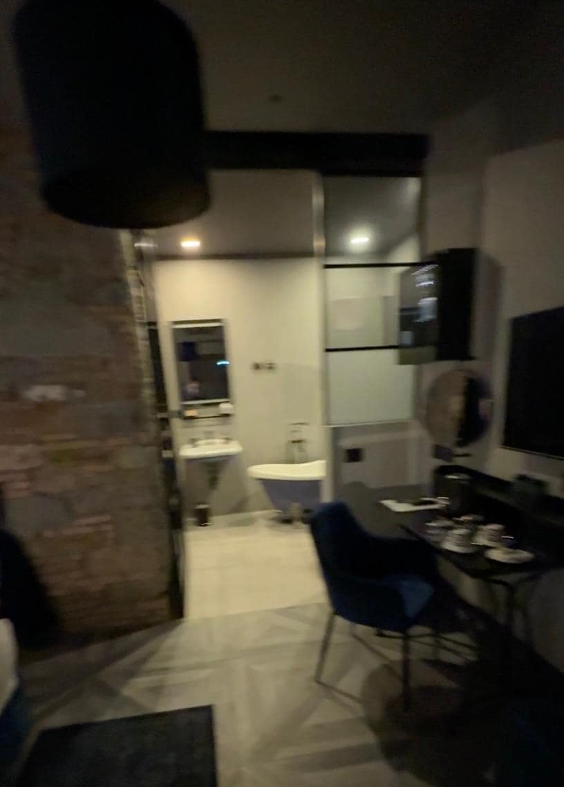 Bathroom & desk, fridge on the wall