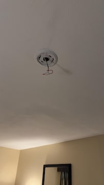 Missing light with exposed wires (Mentioned)