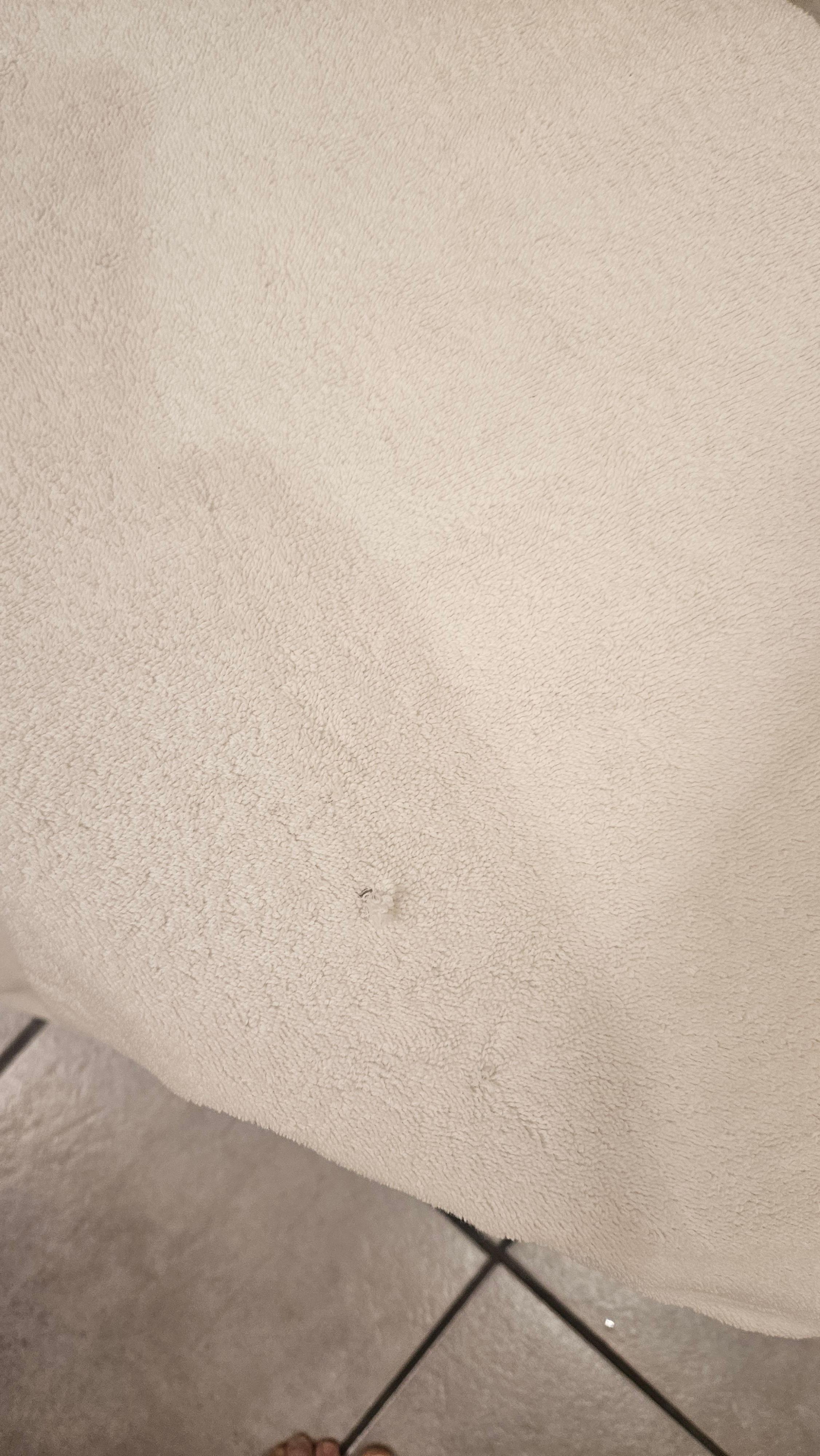 Stained bathtub mat/towel