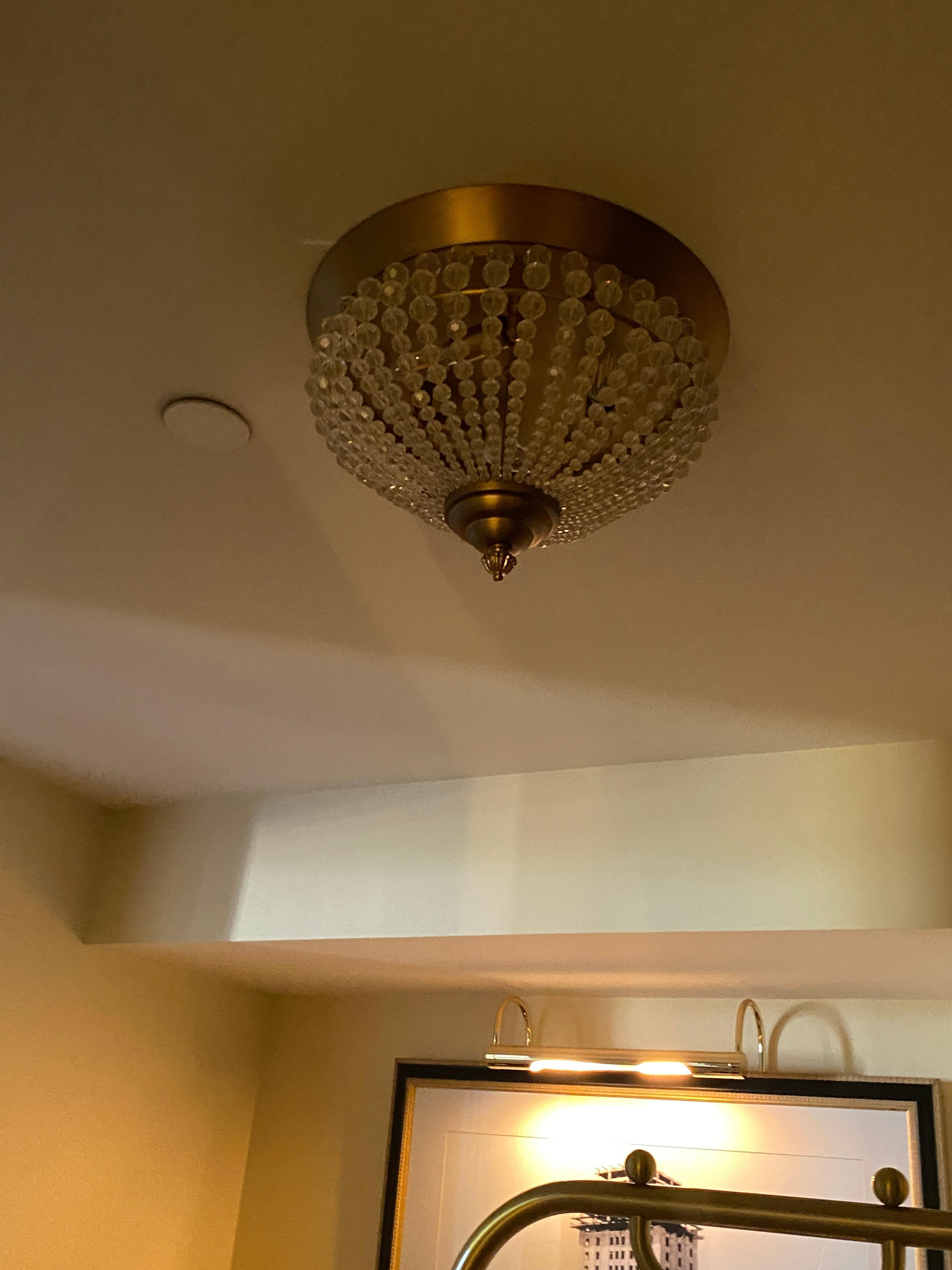 Even the lamps, valances, brass lighting over pictures