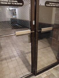 Unlocked and ajar door between corridors