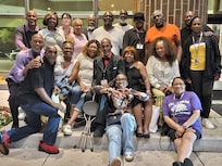 Family photo in front of the Westin Hotel in Detroit Southfield