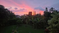 A lanai with a view- the yard at sunrise
