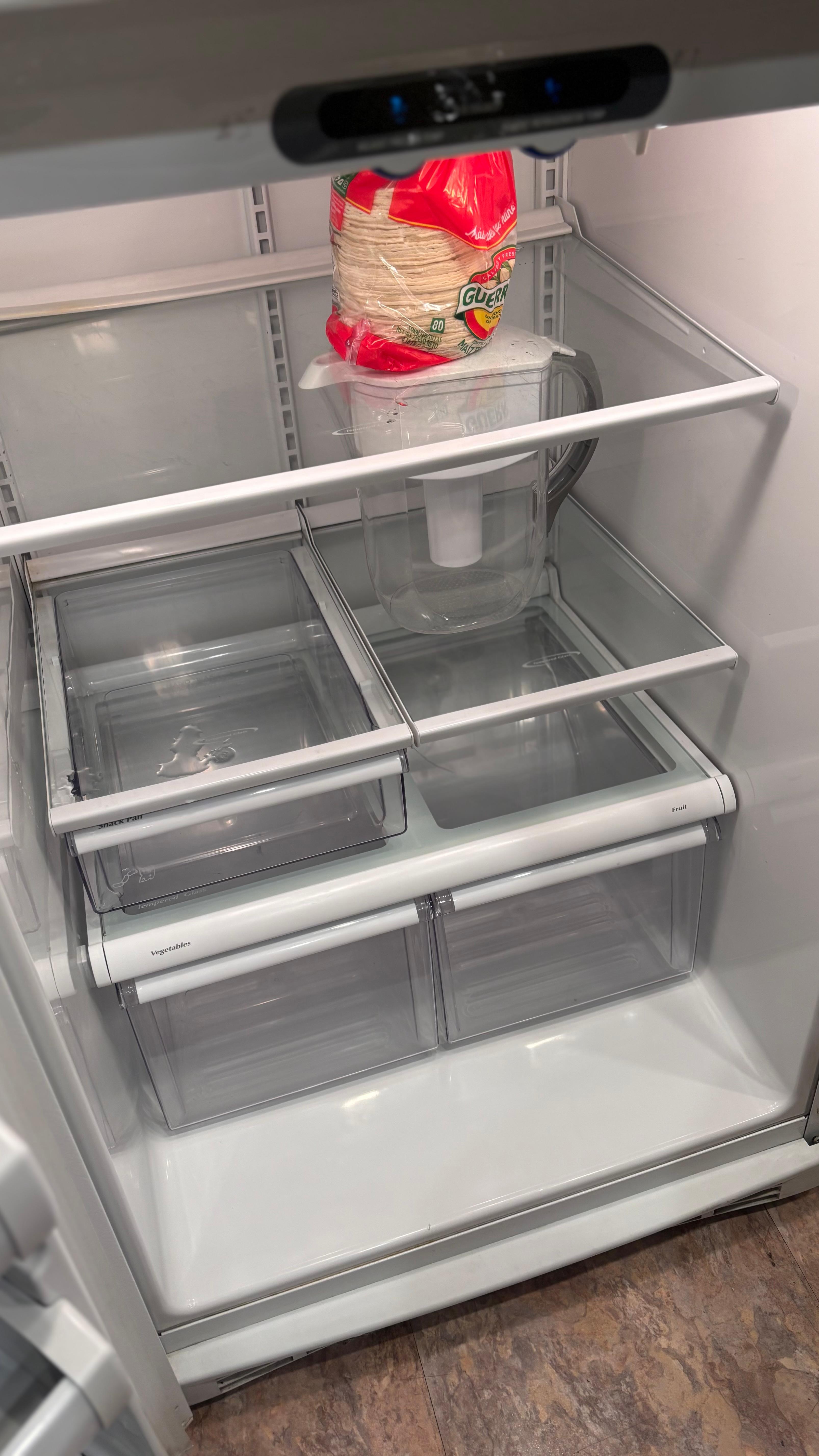 Top shelf is broken the water jar is holding on to it