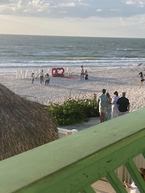 We saw a romantic proposal on the beach - everyone clapped for happy couple.