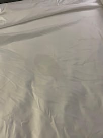 Stain on bed.