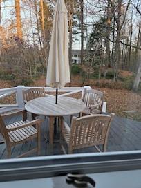 Outside patio set looking out in the backyard.