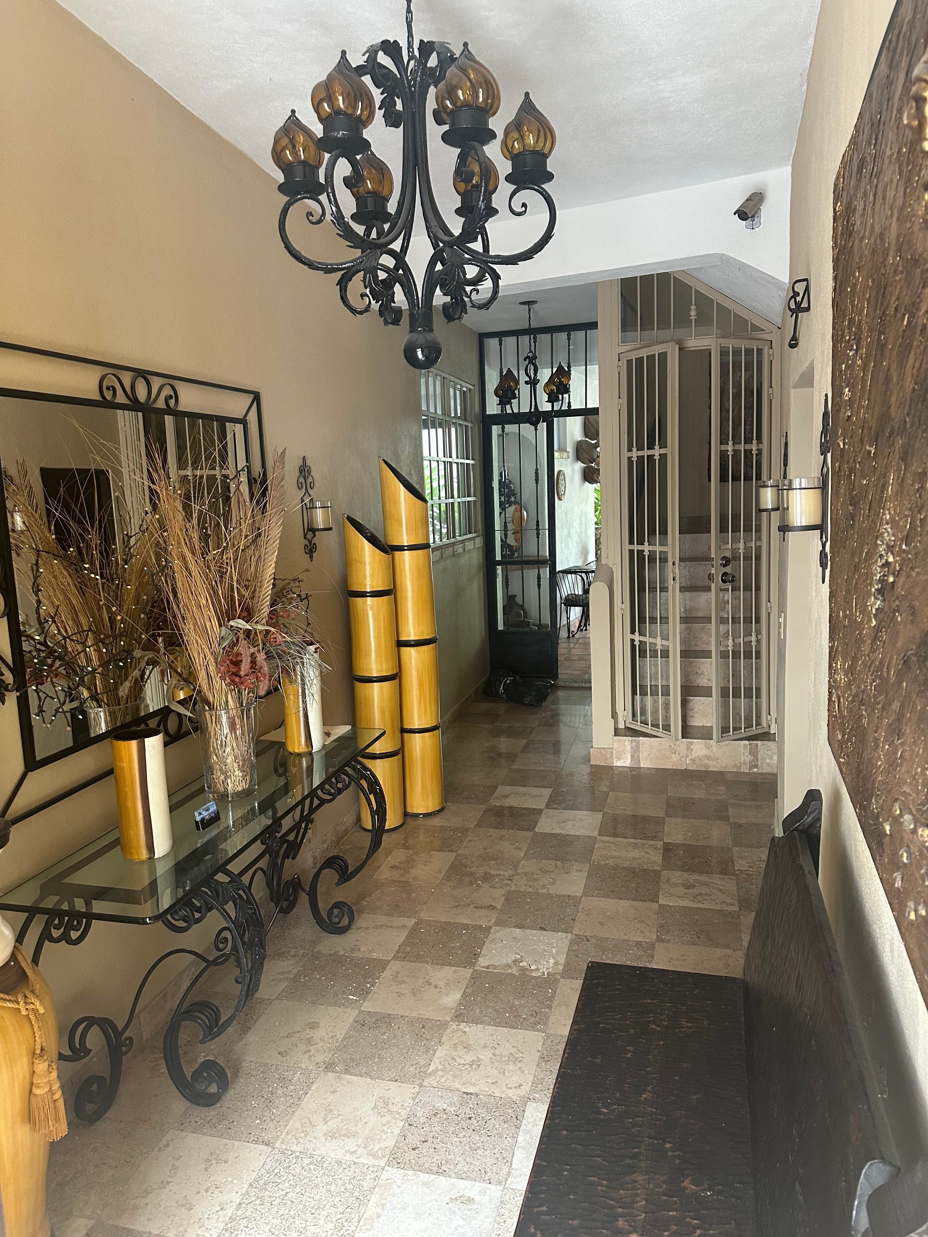 Main entrance front door which is 2nd floor where the studio and 1 bedroom suites are located 
