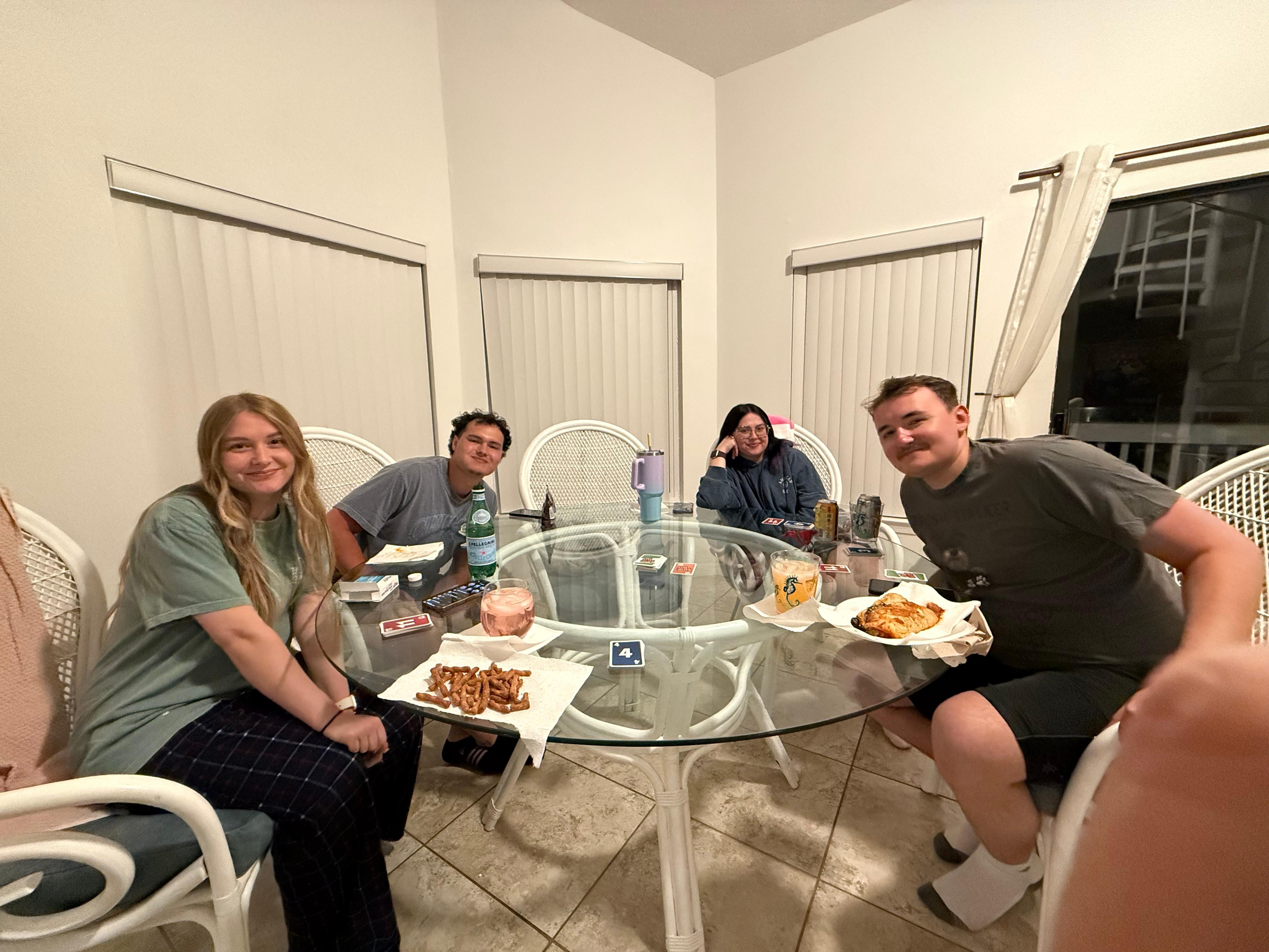 Card games around the spacious table. 