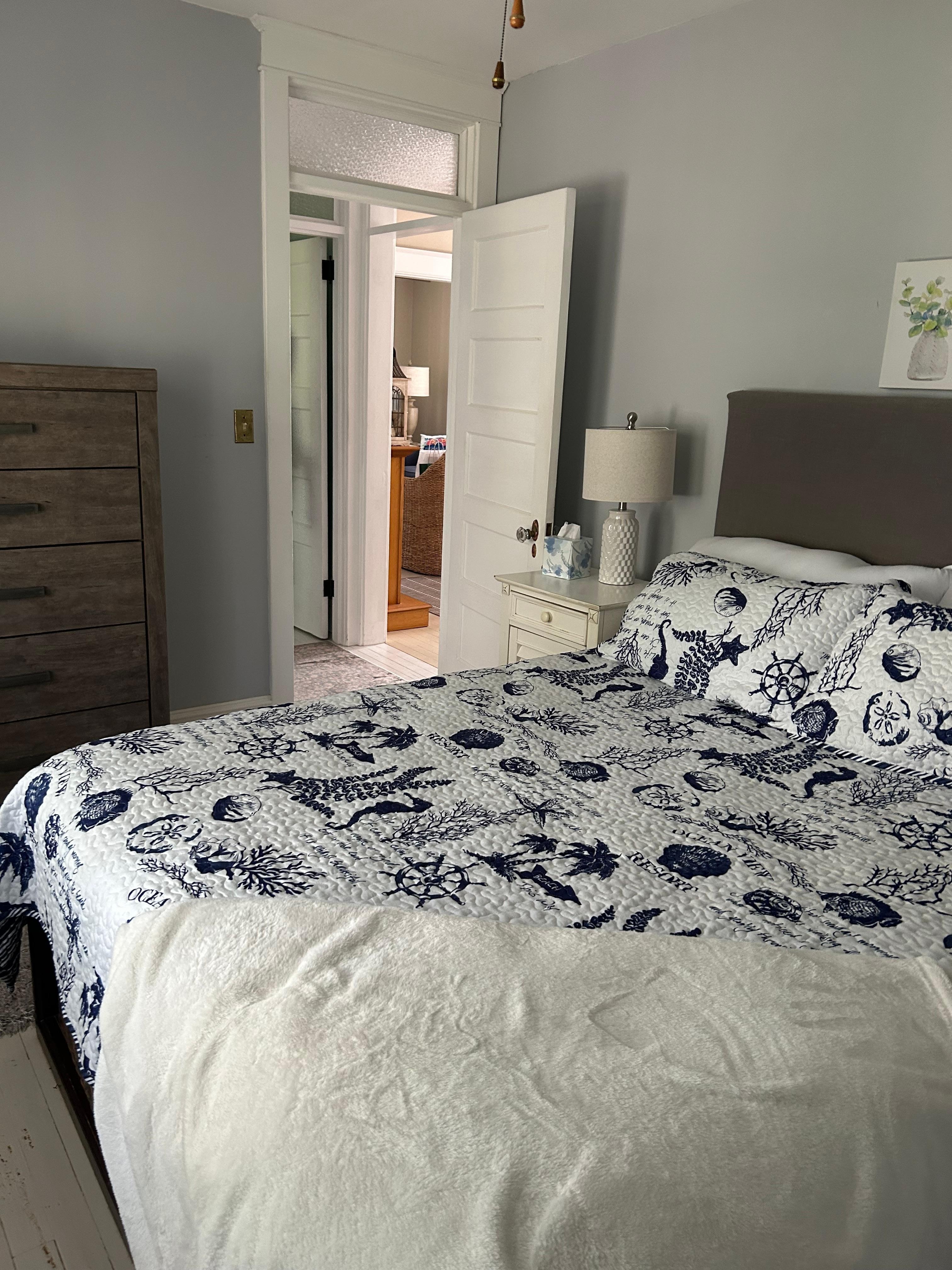 Comfortable bedroom with queen size bed. 