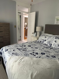 Comfortable bedroom with queen size bed.