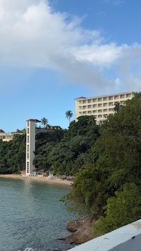 Hotel from the bridge, small strip of beach where the sun goes behind the bridge from 4 pm